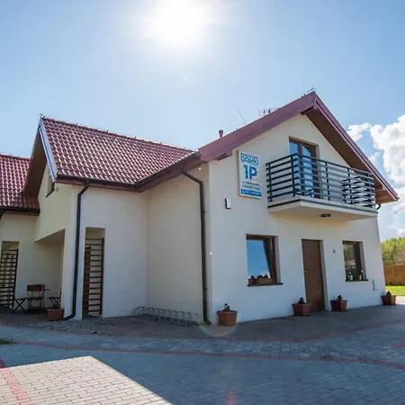 Piaskowe Domki Lodge
